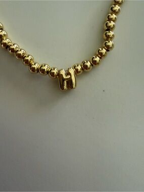 NWOT - Gold PVD tarnish redistant  'H' Bead Bracelet